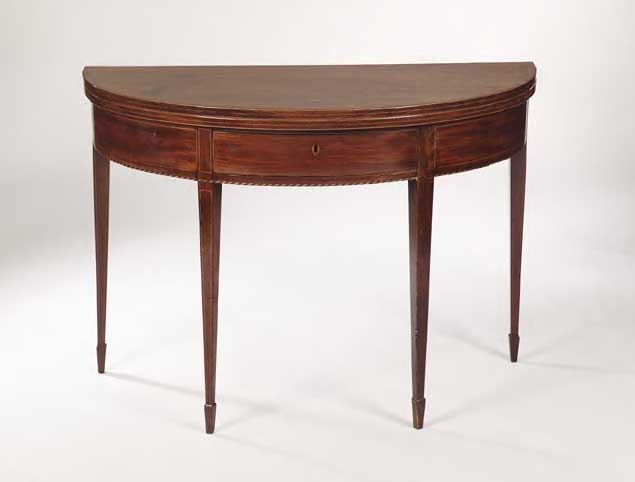 A George III mahogany fold-over tea table,