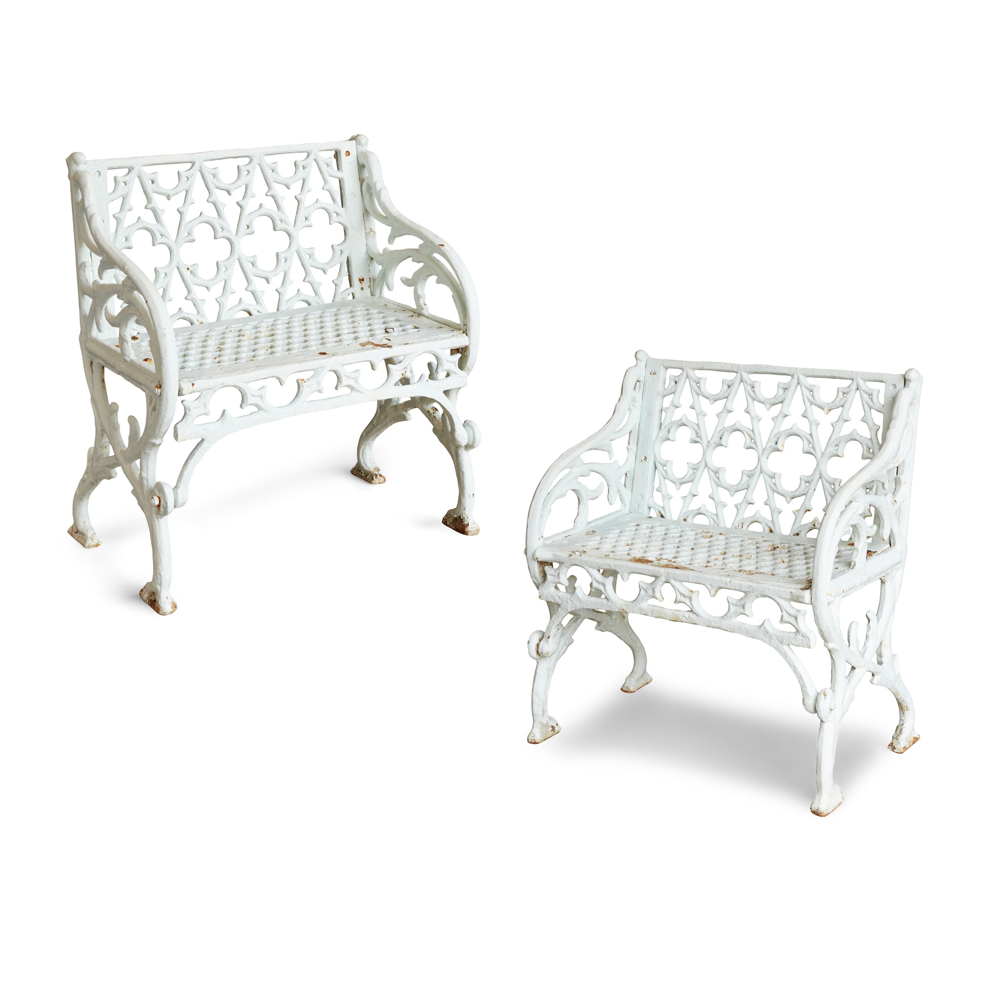 PAIR OF VICTORIAN CAST IRON 'GOTHIC' GARDEN SEATS, IN THE MANNER OF VAL D'OSNE