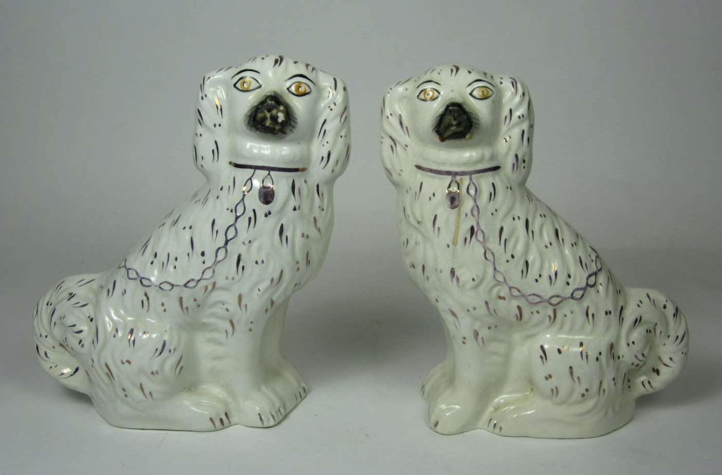 Past auction: PAIR OF STAFFORDSHIRE POTTERY LION FIGURES 21 July