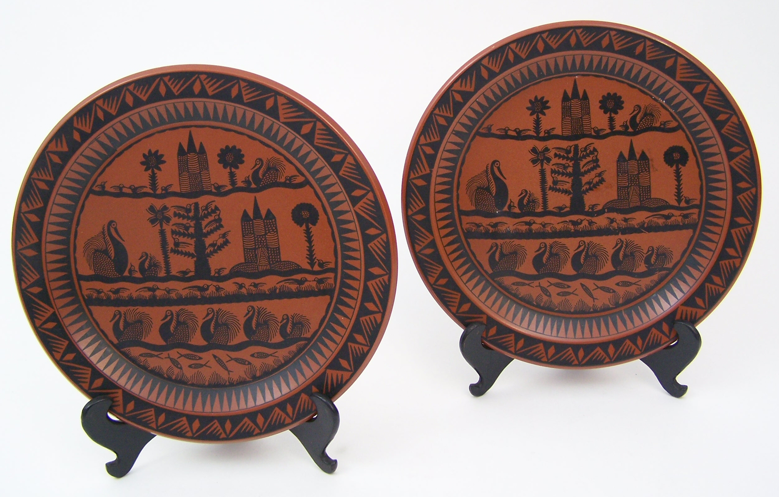 Scottie Wilson (1891-1972) Two dinner plates,