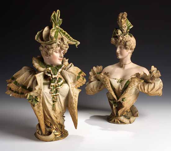 A pair of Viennese coloured bisque porcelain busts of ladies