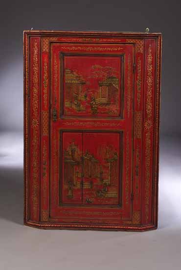A George II japanned corner cabinet