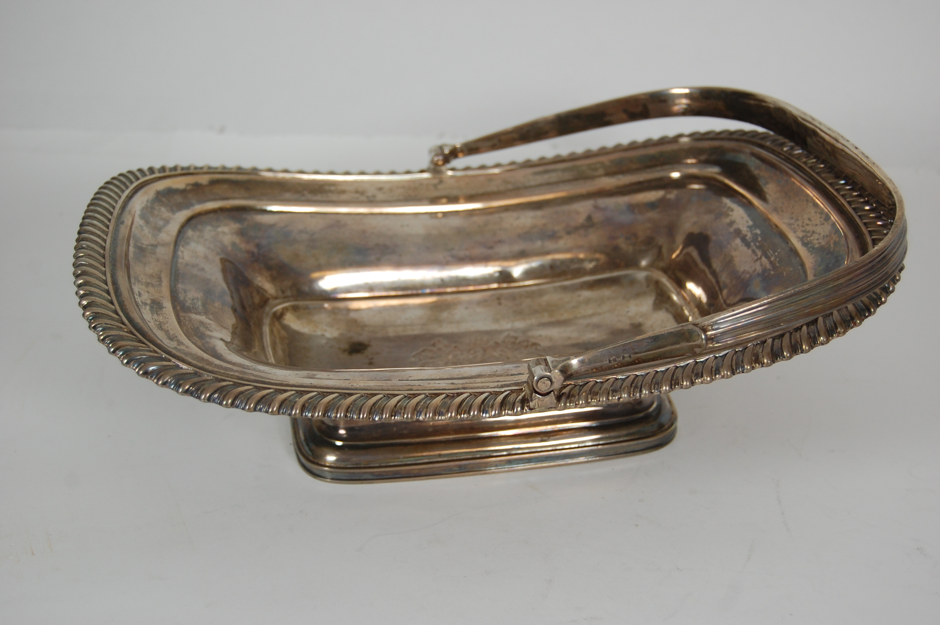A George IV swing handled bread basket