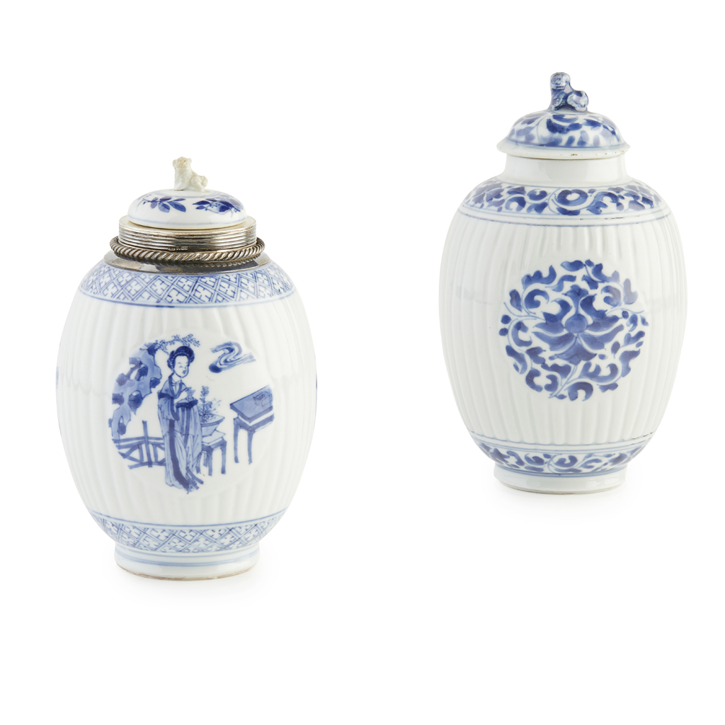 TWO REEDED OVIFORM JARS AND COVERS