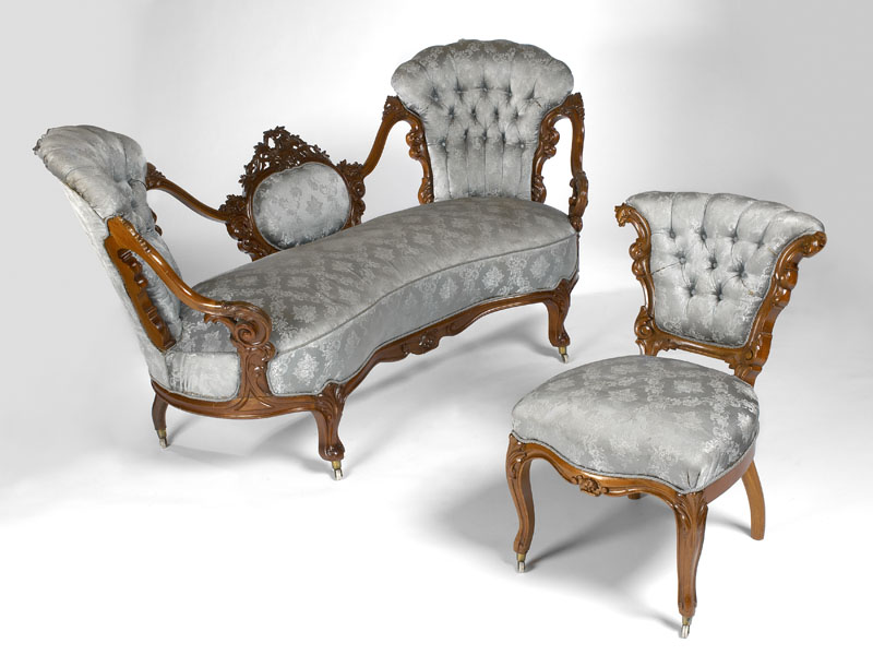 A mid 19th century carved walnut settee