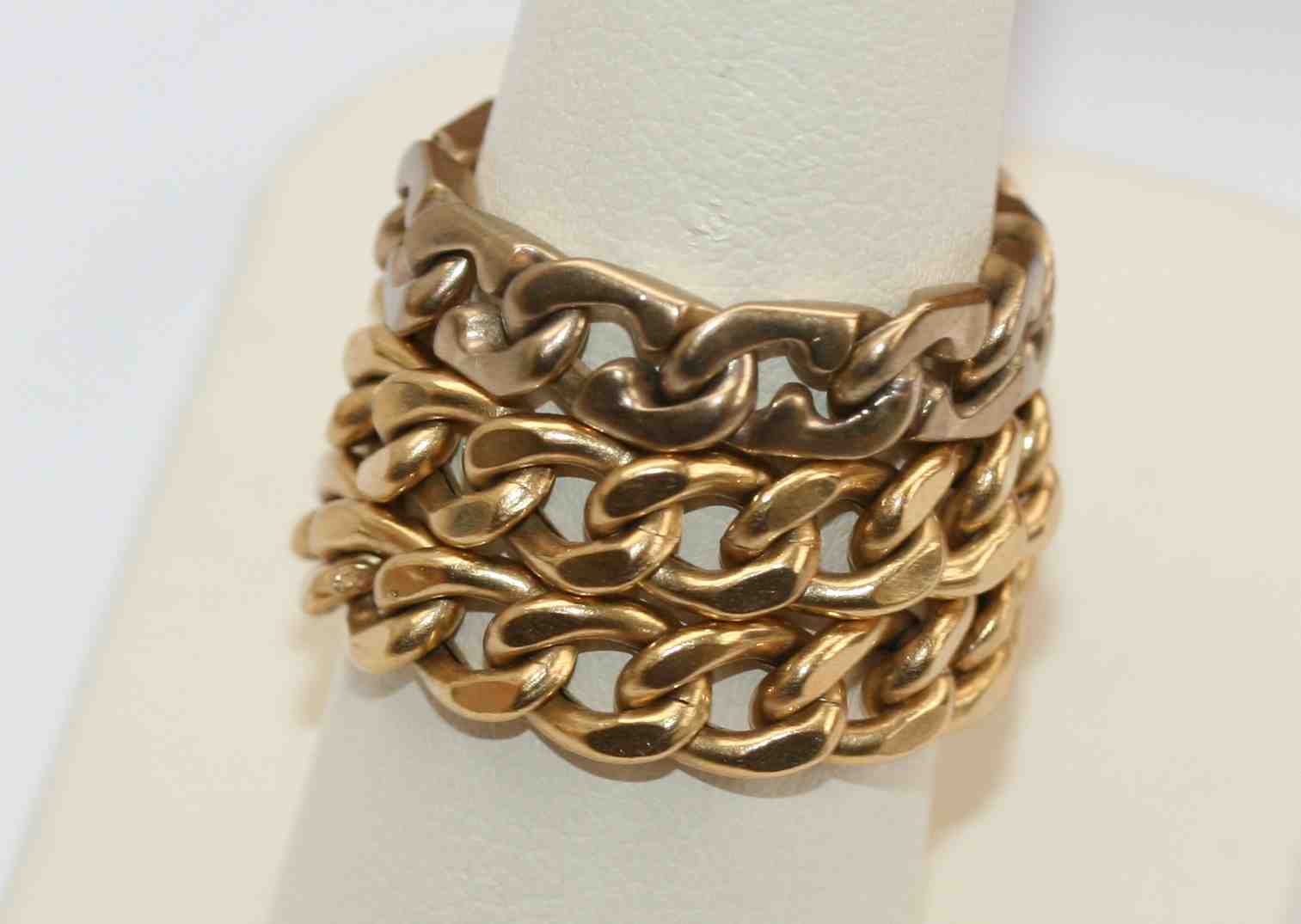 A group of three 9ct gold curb link rings