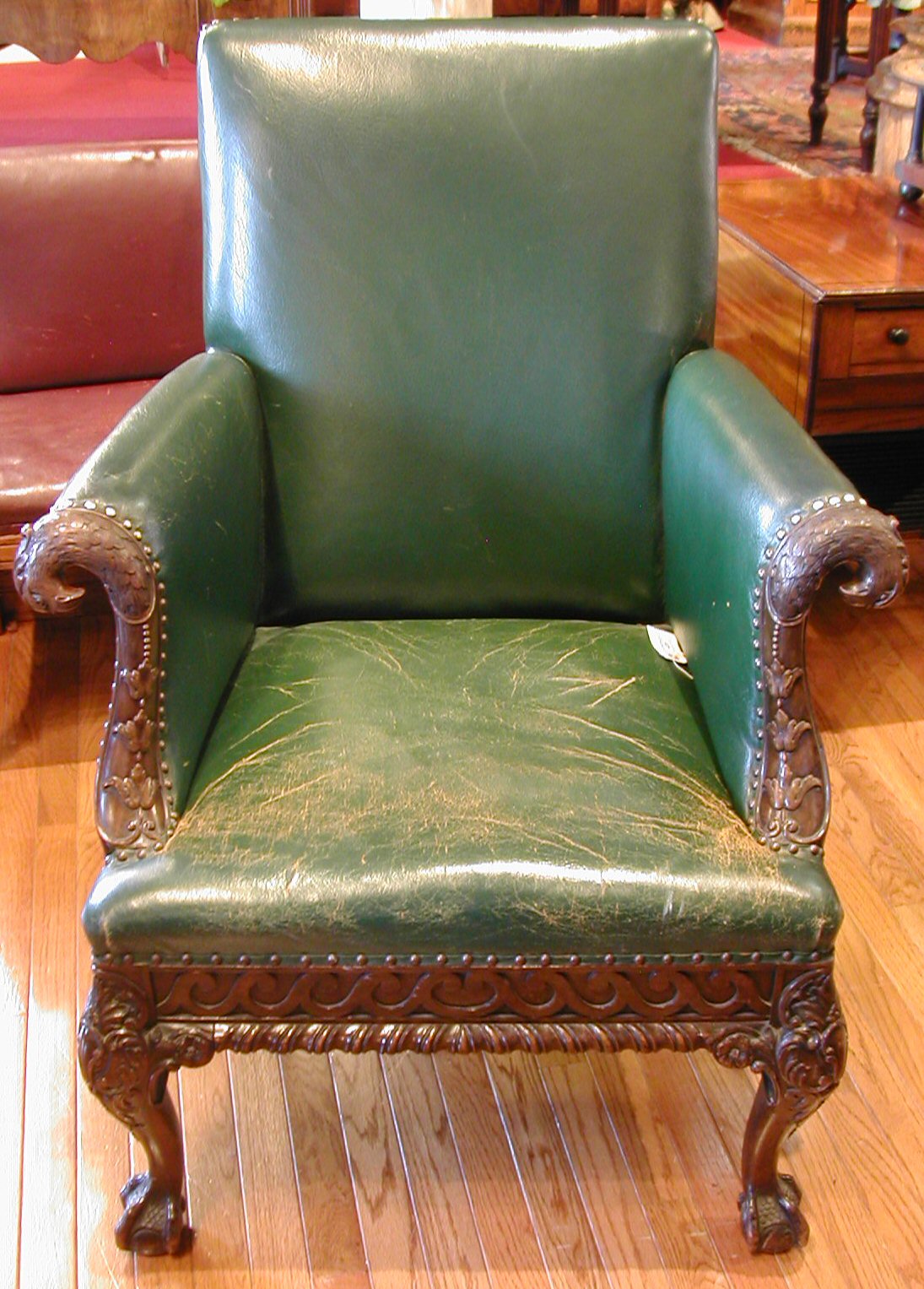 An early 20th century George II style mahogany armchair,