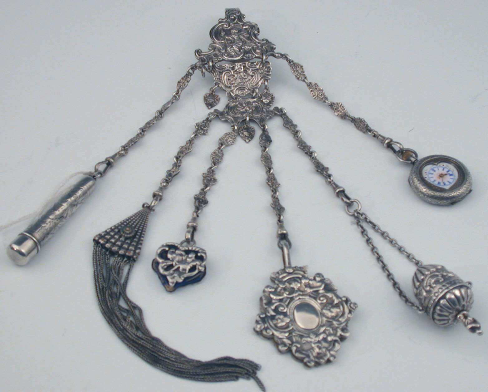 A Victorian silver chatelaine,