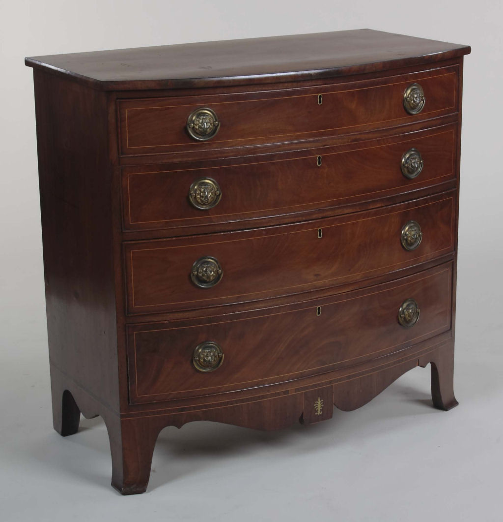 A 19th century mahogany bow front chest