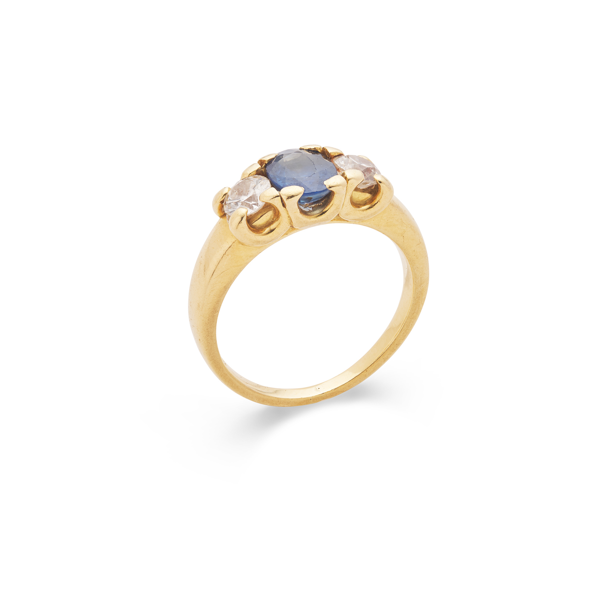 A sapphire and diamond three-stone ring