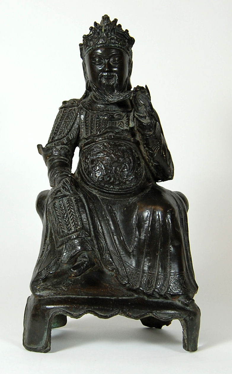 A Chinese bronze figure of Guandi, the warrior God, late Ming or early Qing dynasty