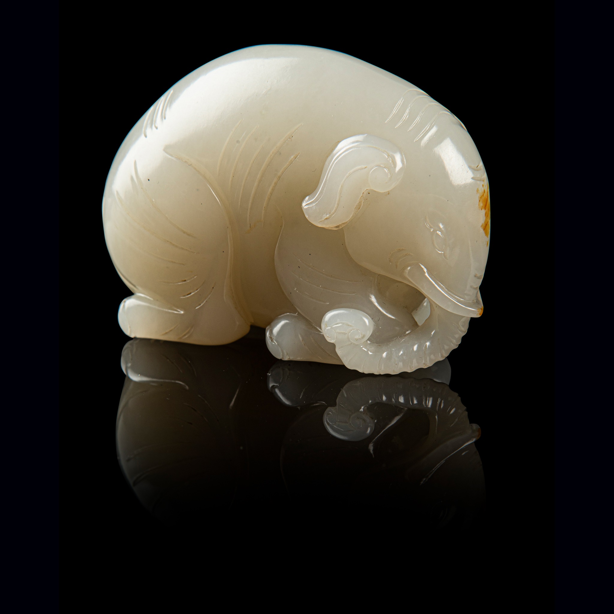 WHITE JADE CARVING OF AN ELEPHANT