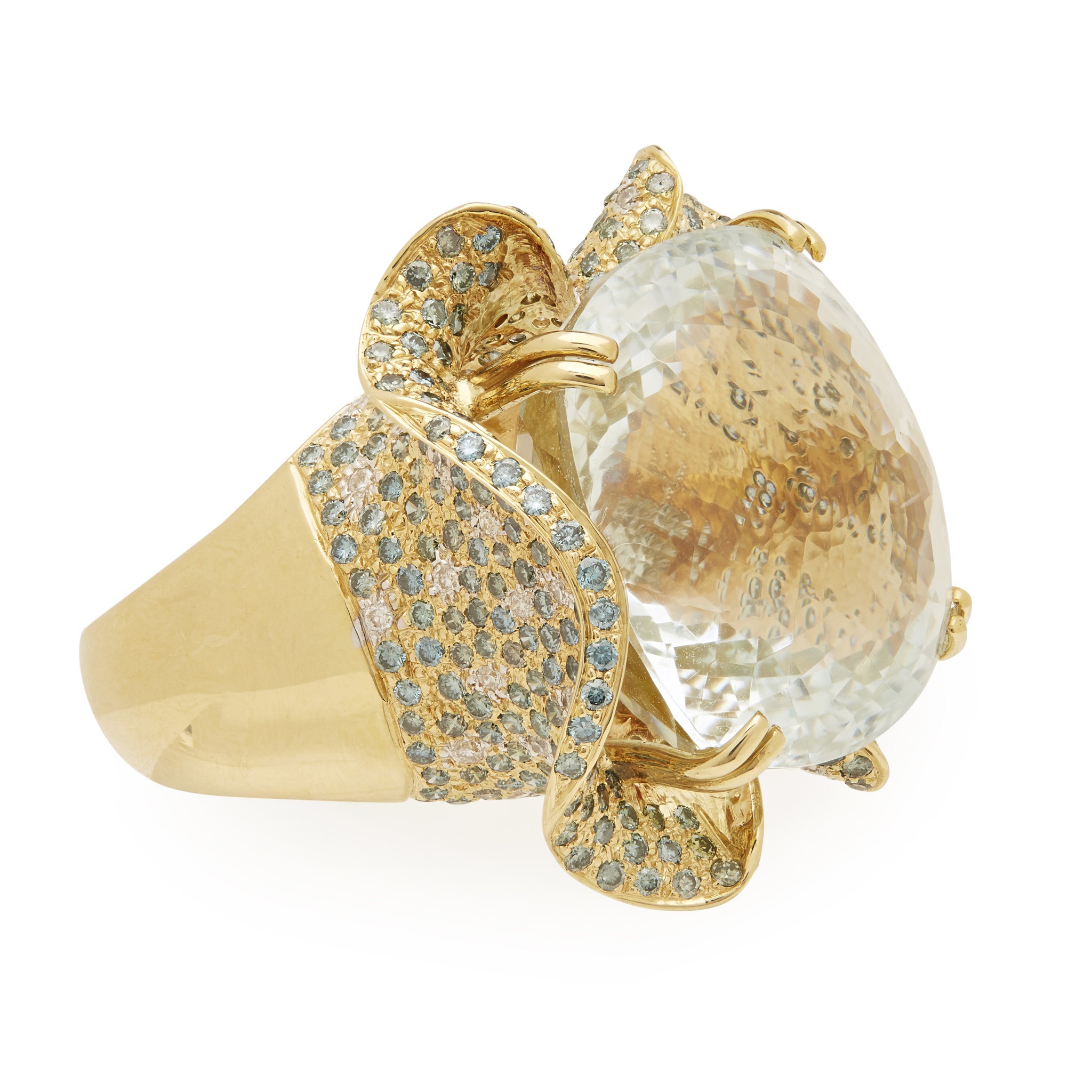 A large aquamarine and diamond set cocktail ring