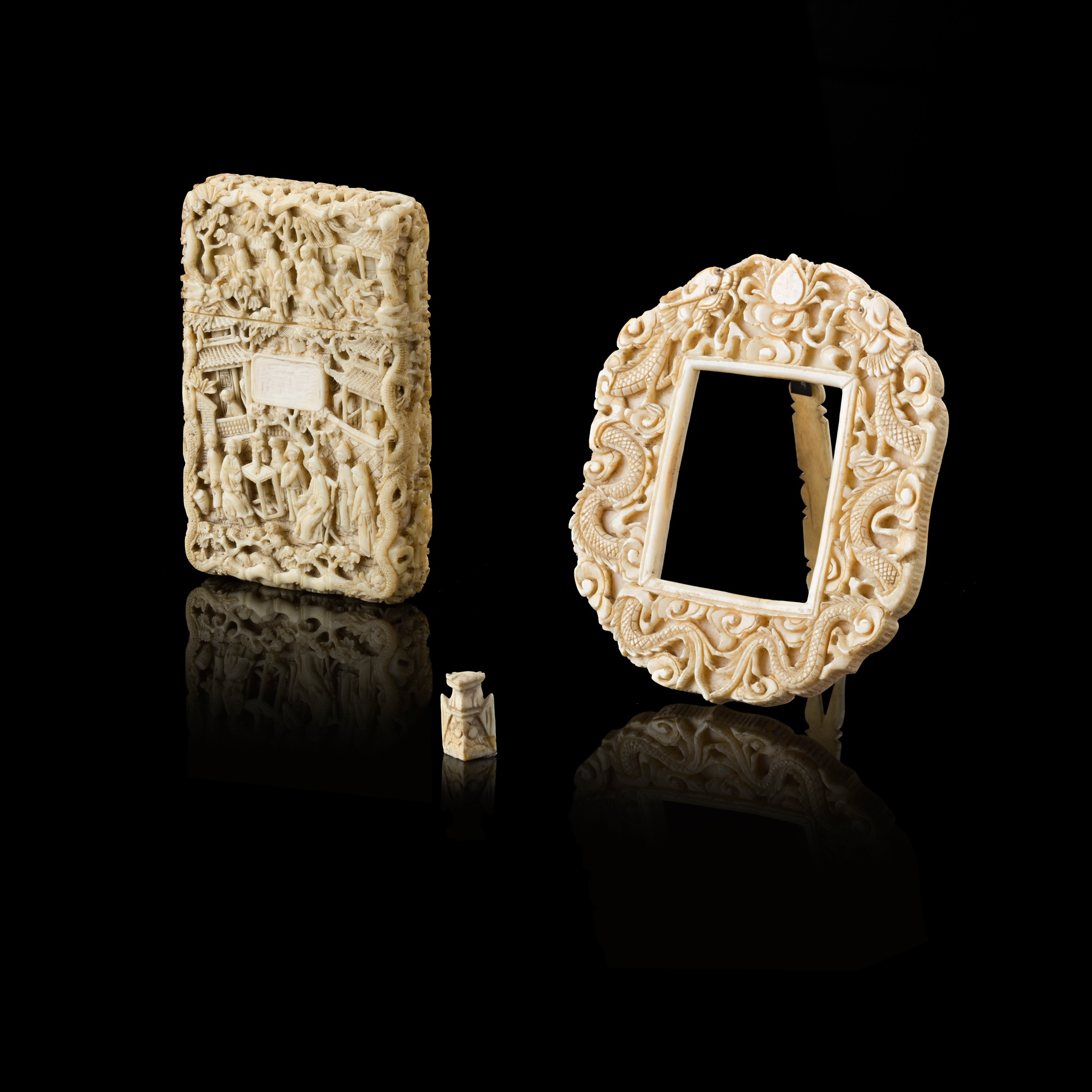 GROUP OF THREE CARVED IVORY ARTICLES