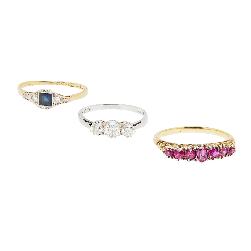 A three stone diamond set ring