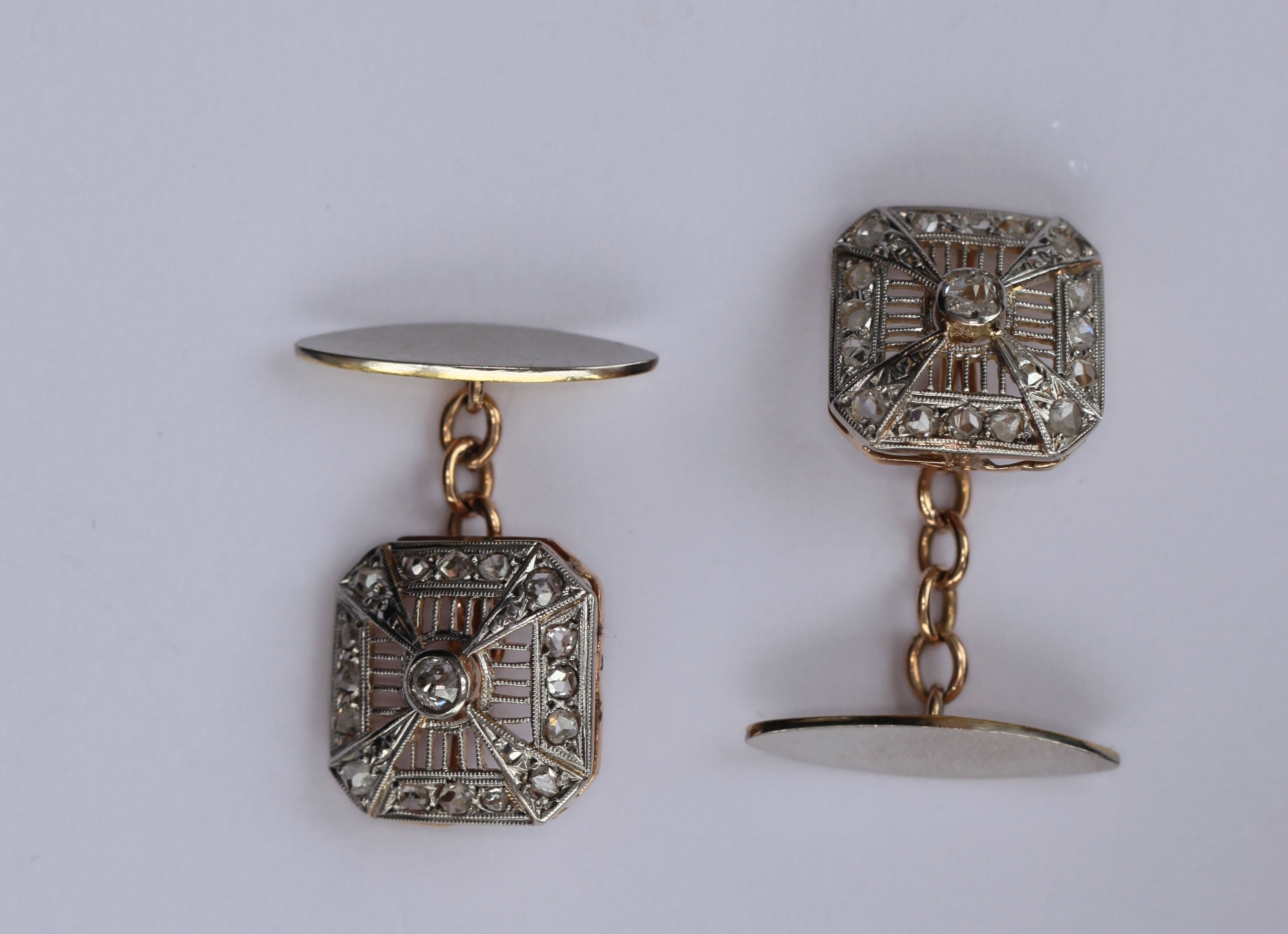 A pair of early 20th century diamond set cufflinks