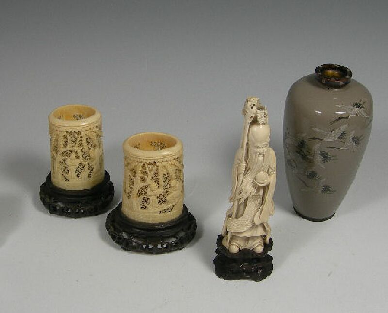 A Chinese carved ivory sage