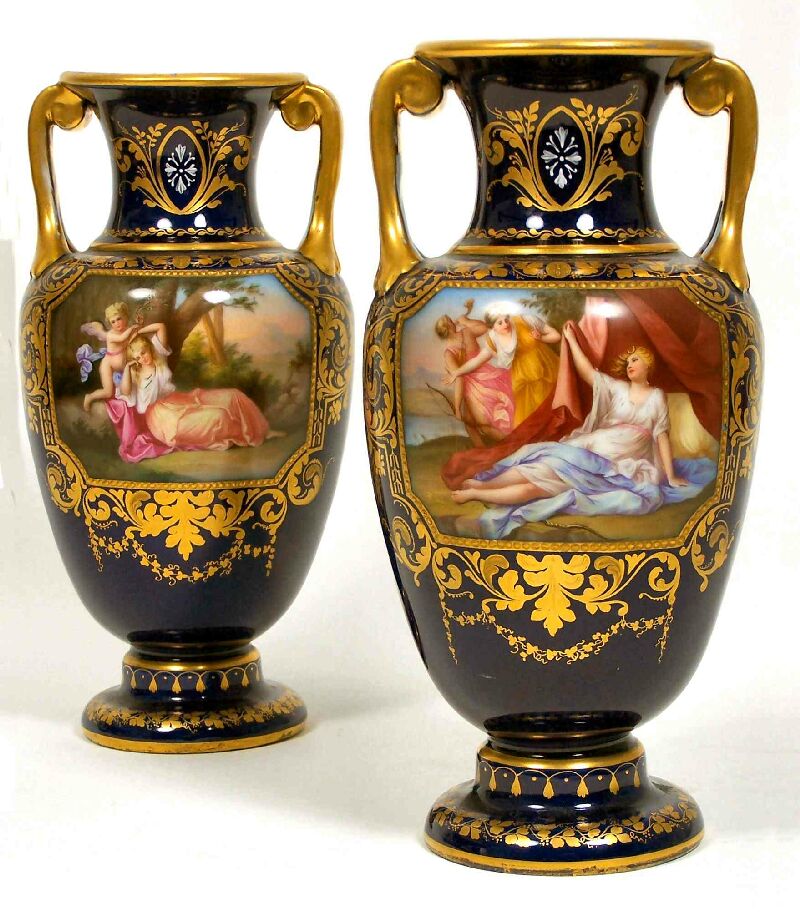 A pair of late 19th century Vienna twin handled vases