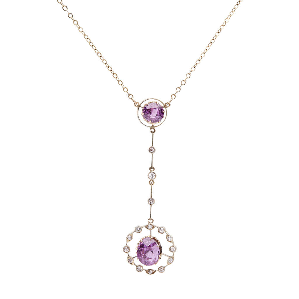 A pink sapphire and diamond set pendant