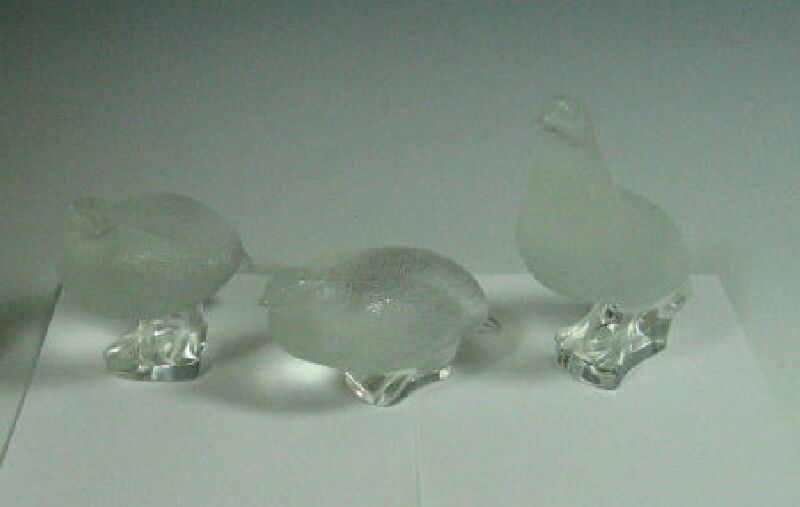 A collection of three Lalique grouse