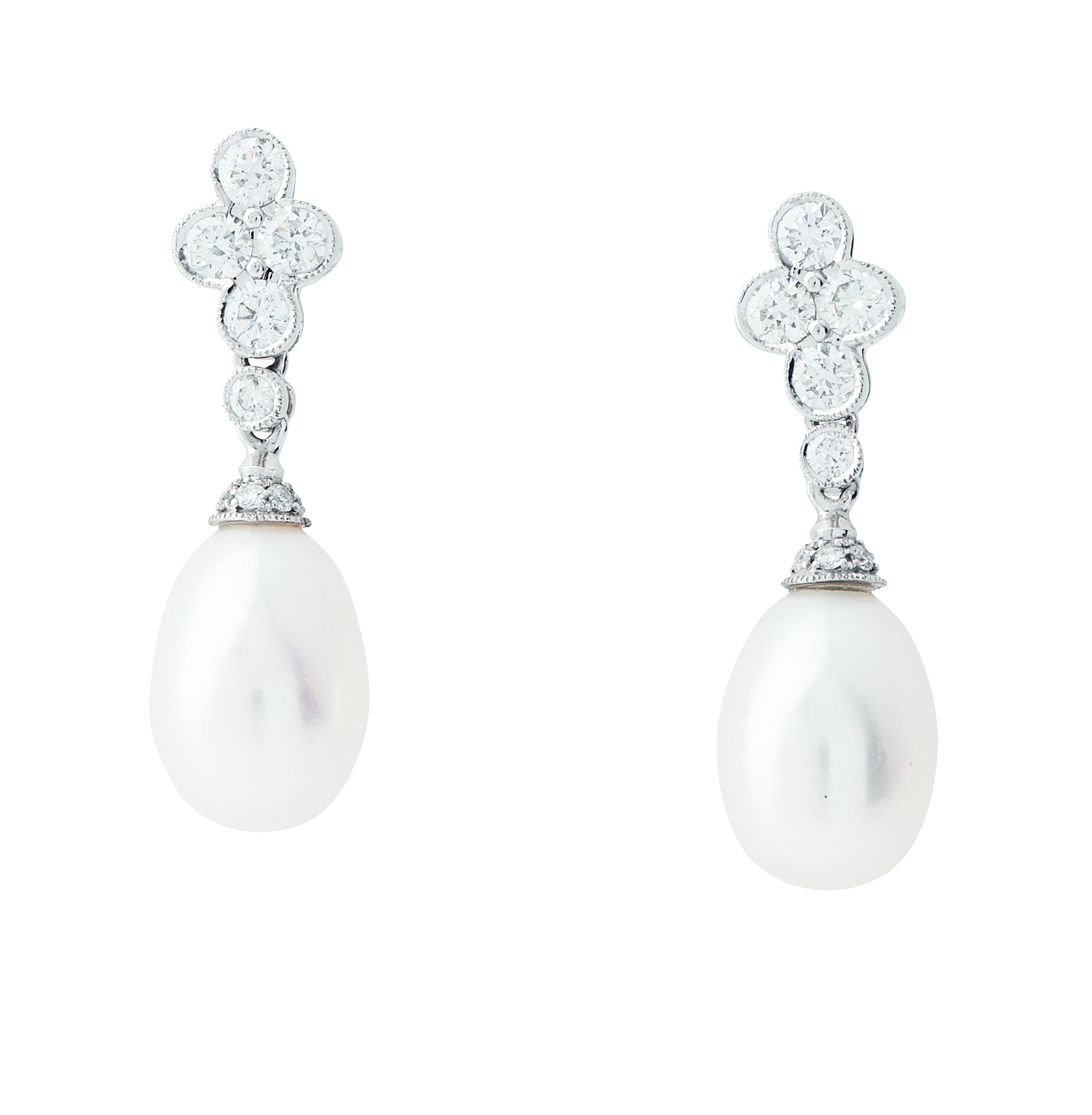 A pair of pearl and diamond set pendant earrings
