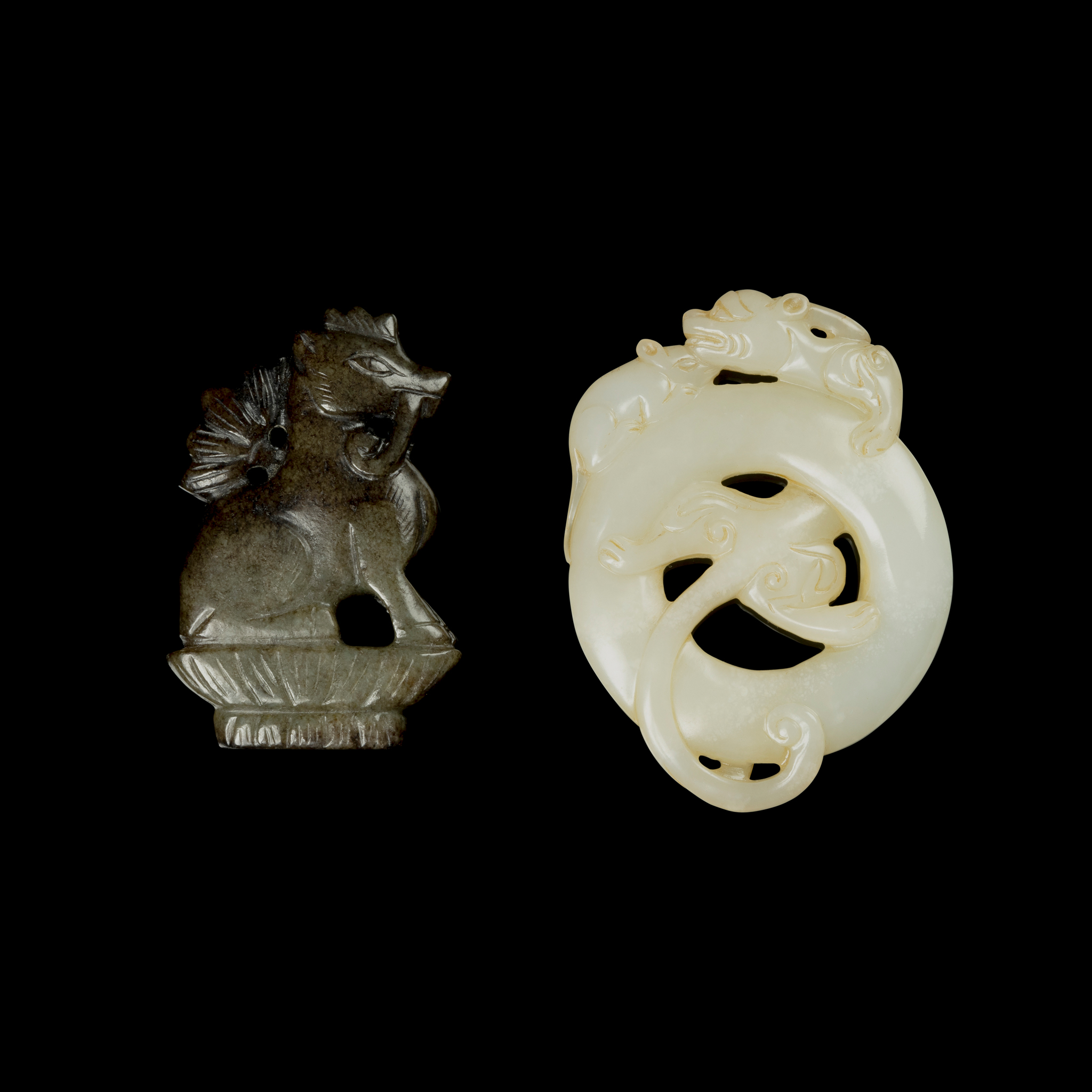 TWO CHINESE JADE PENDANTS