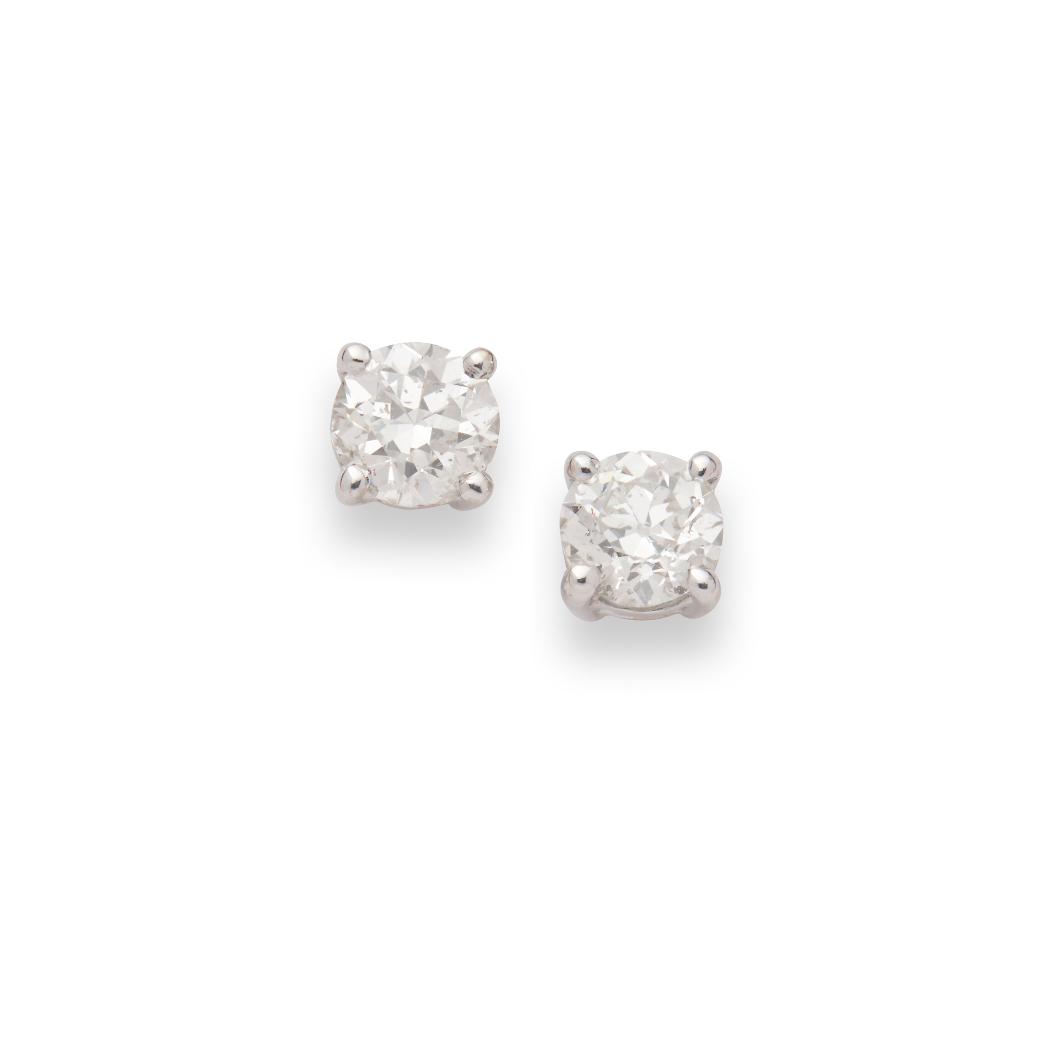 A pair of diamond stud earrings