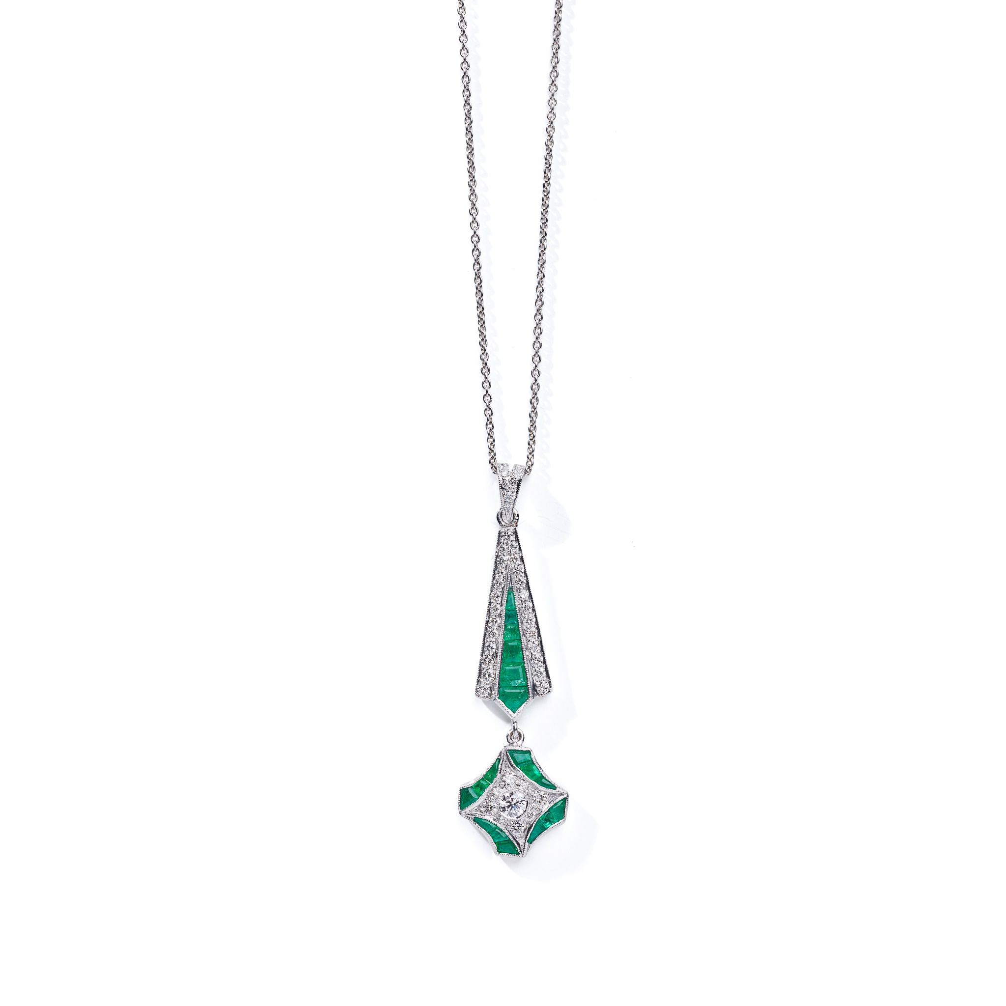 An emerald and diamond pendant