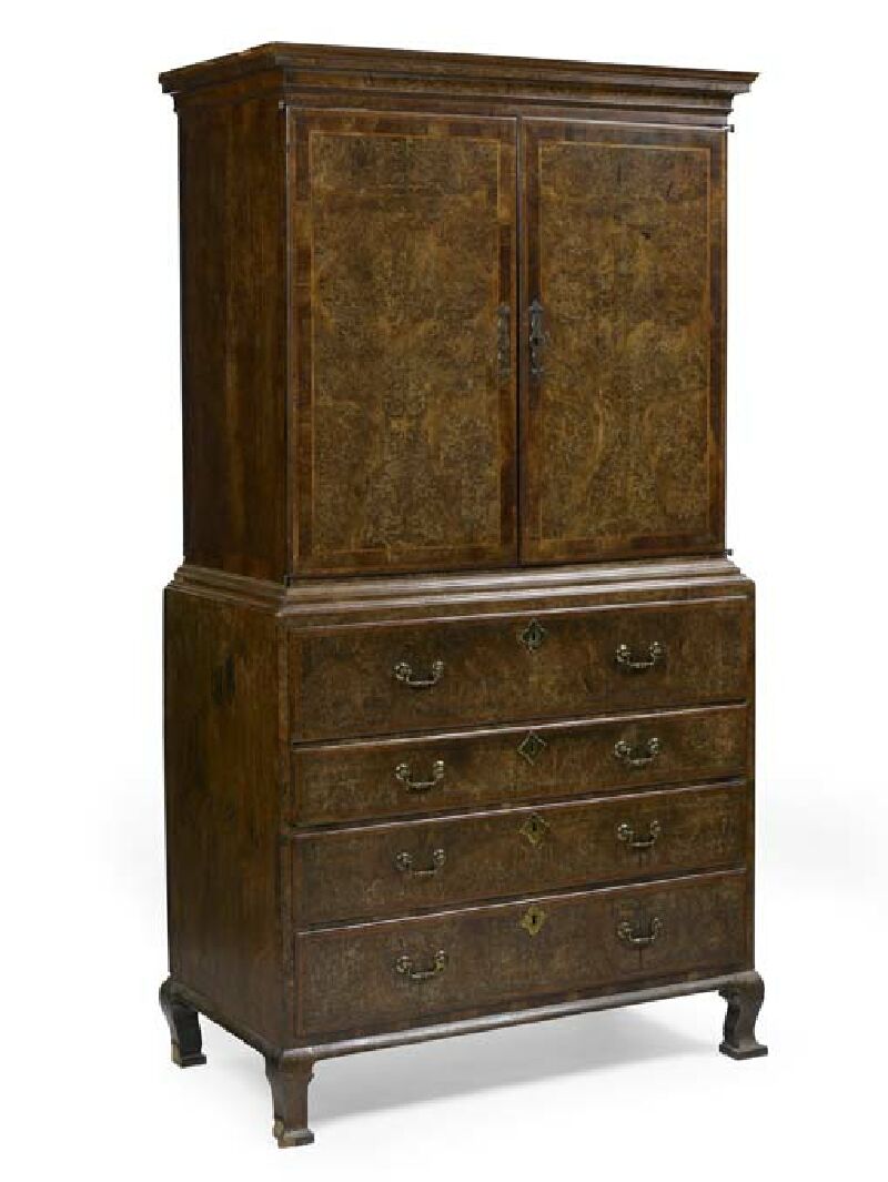 A burr walnut and crossbanded secretaire cabinet In the early 18th century manner