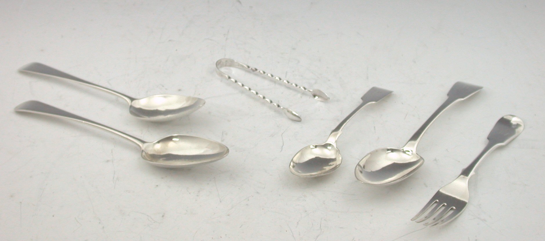 A composite group of fiddle pattern flatware,