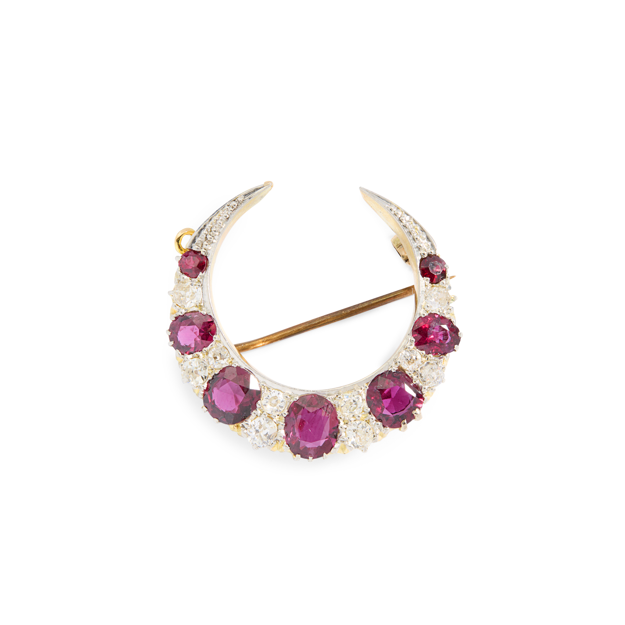 A late 19th century ruby and diamond crescent brooch