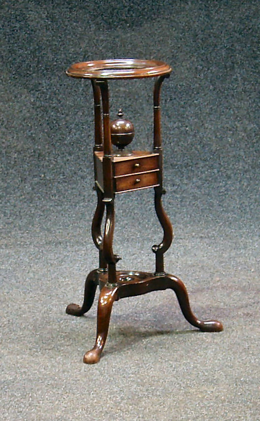 A 19th century mahogany wig stand