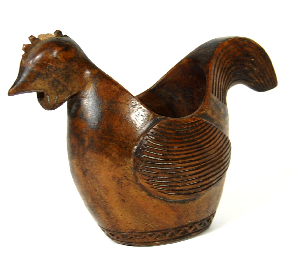 A 19th century Norwegian carved birch kasas