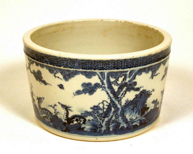 A Chinese Kangxi style blue painted brush pot