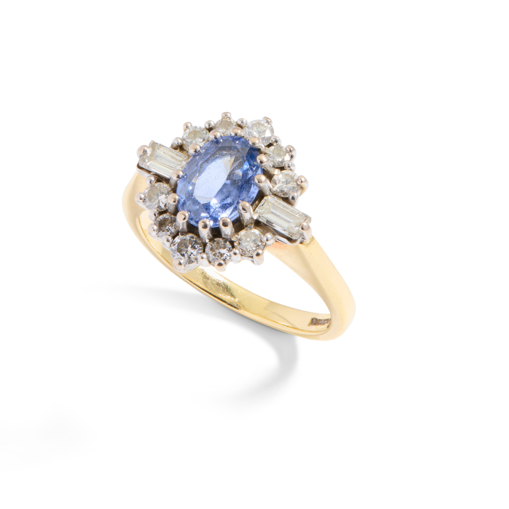 An 18ct gold sapphire and diamond cluster ring