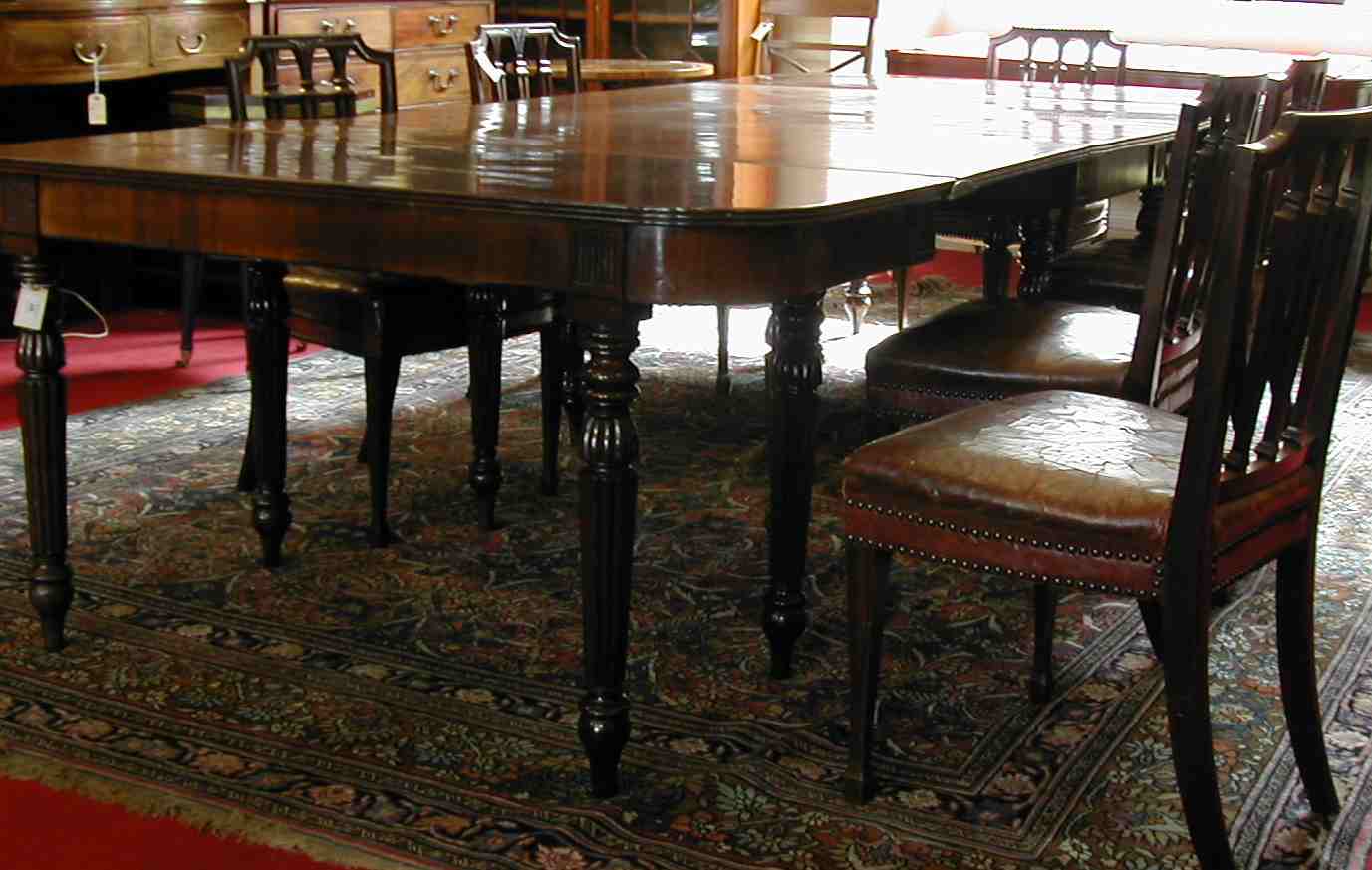 An early 19th century dining table,