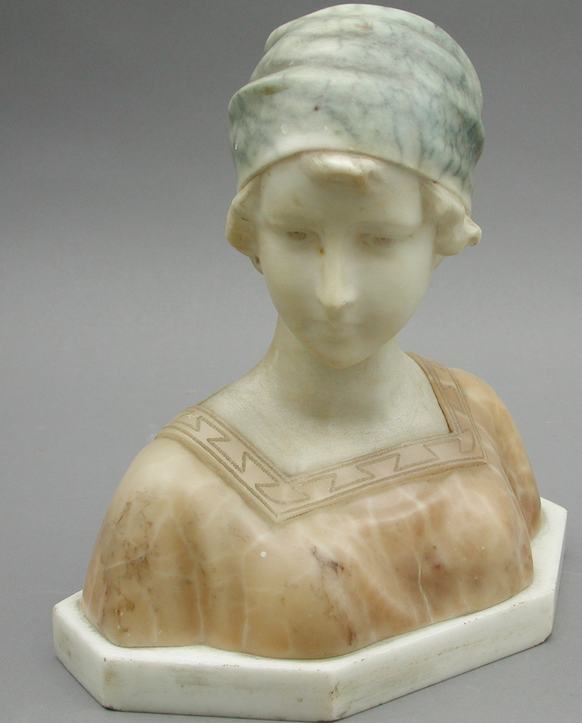 A French early 19th century marble and alabaster bust