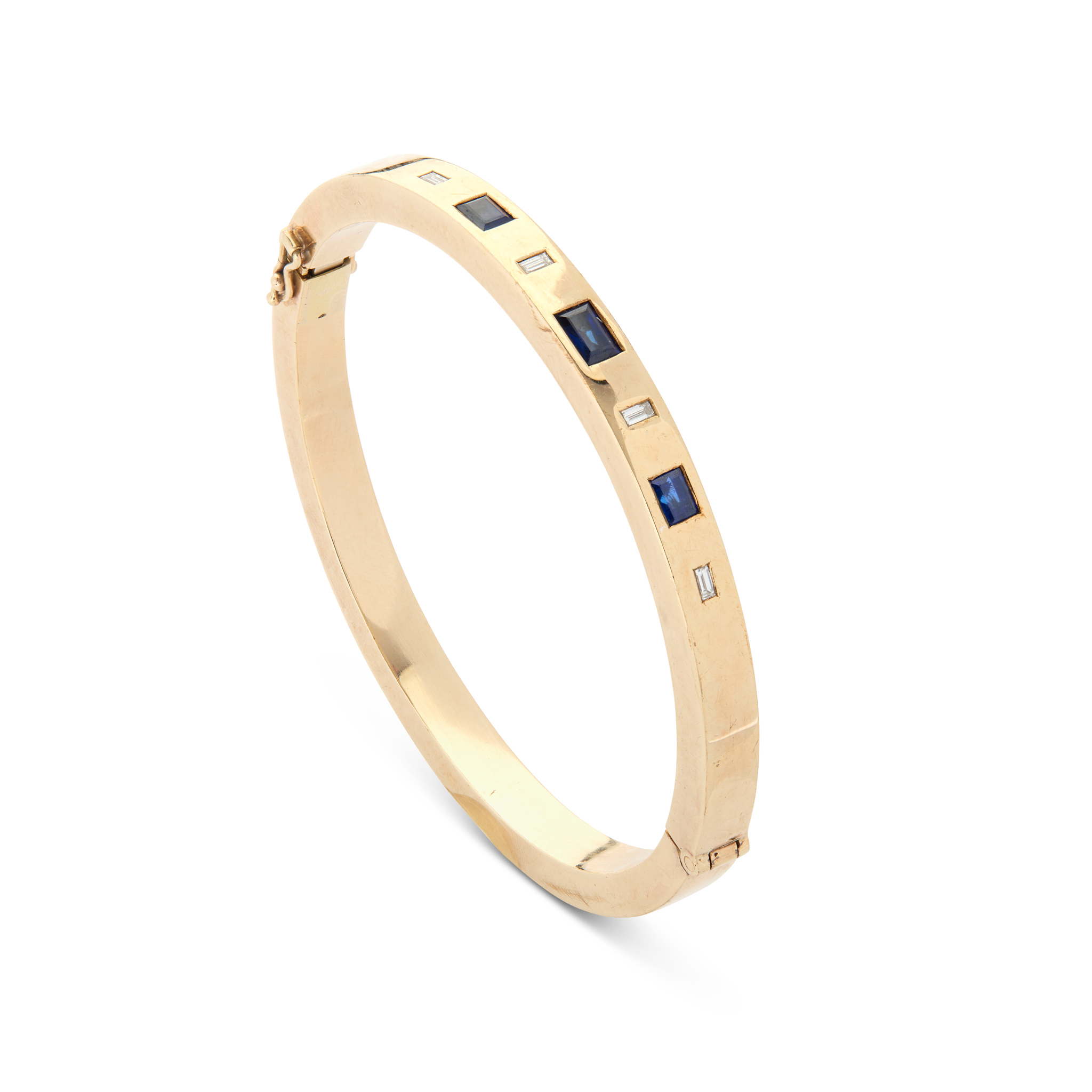 A 9ct gold sapphire and diamond bangle