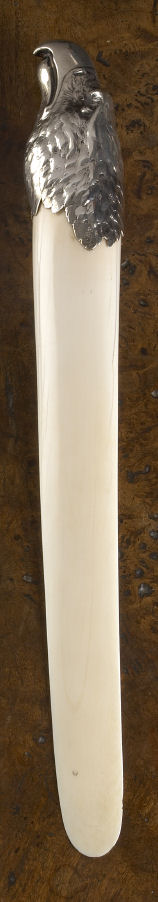 A late 19th century continental silver mounted ivory page turner