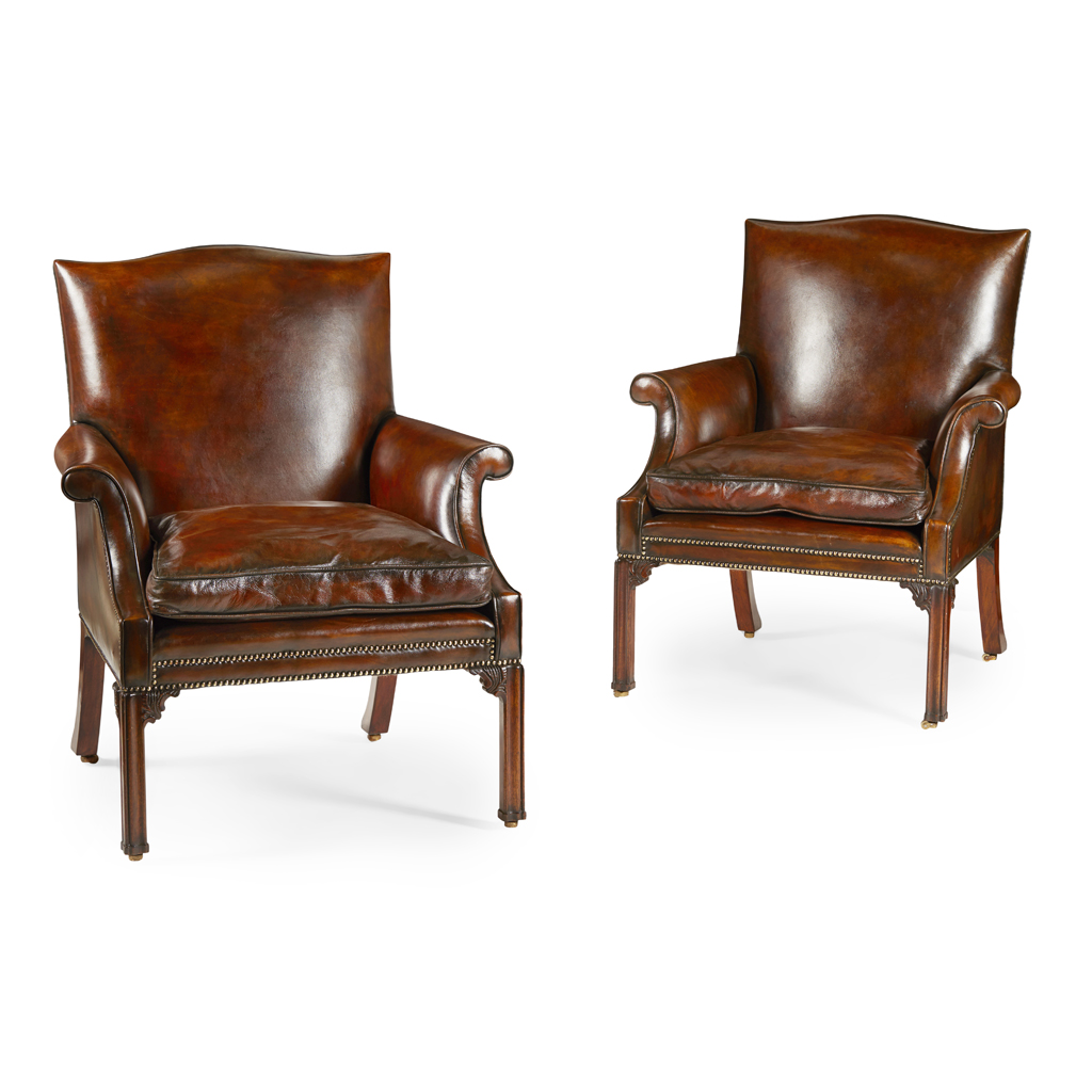 PAIR OF LEATHER UPHOLSTERED GEORGE III STYLE LIBRARY ARMCHAIRS