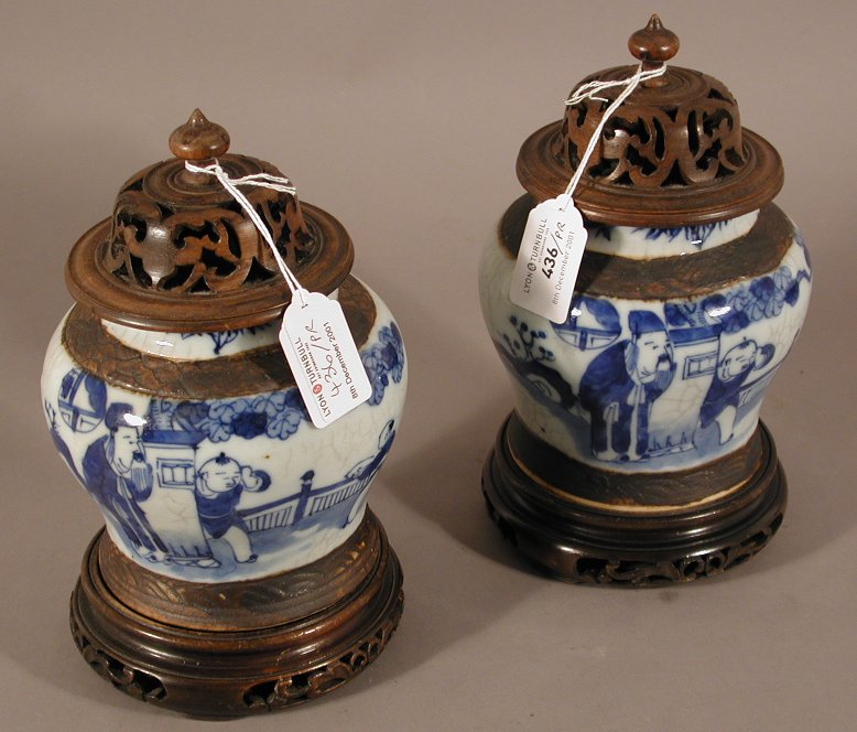 A pair of Chinese blue painted stoneware vases