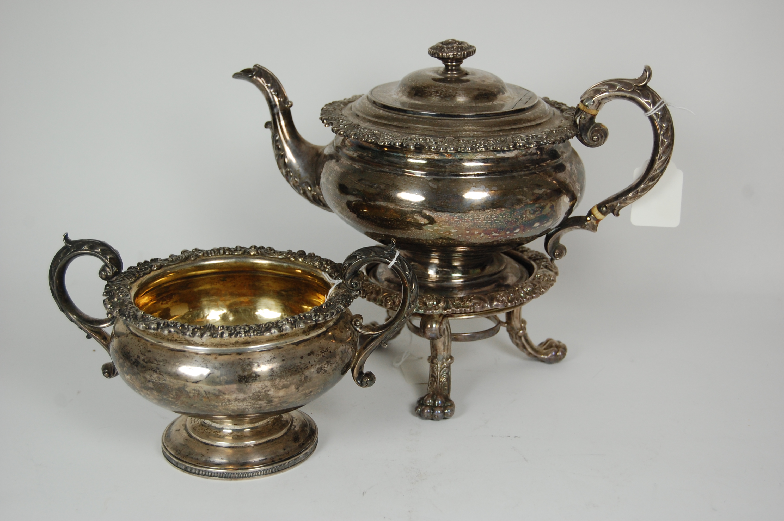 A George IV teapot, stand and sugar bowl