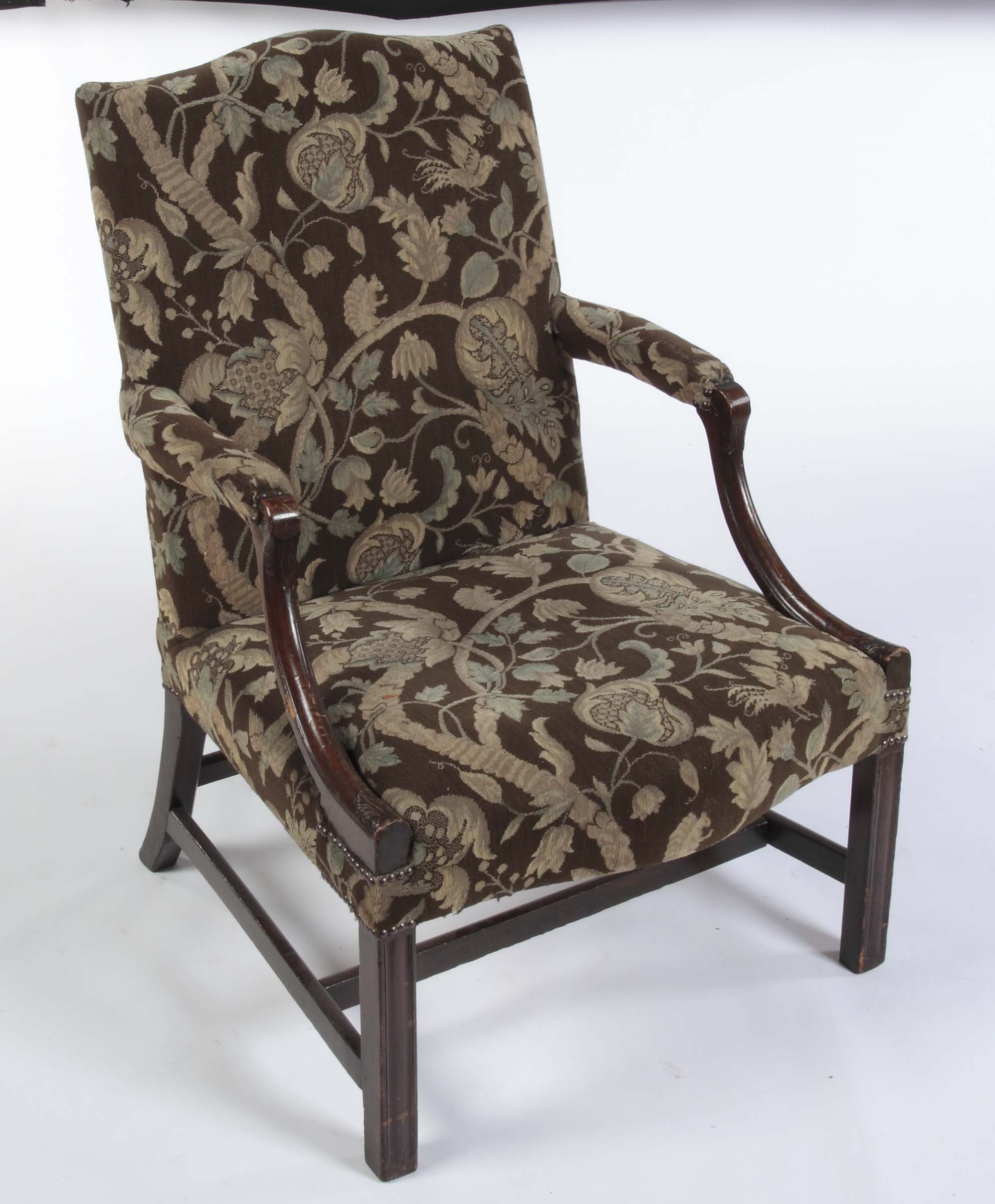 A George III style mahogany framed Gainsborough armchair
