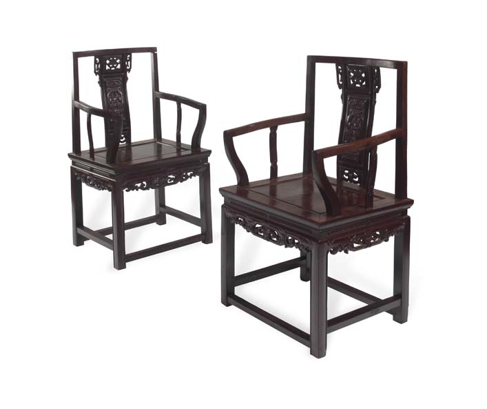 A pair of lacquered Chinese armchairs In the Ming style