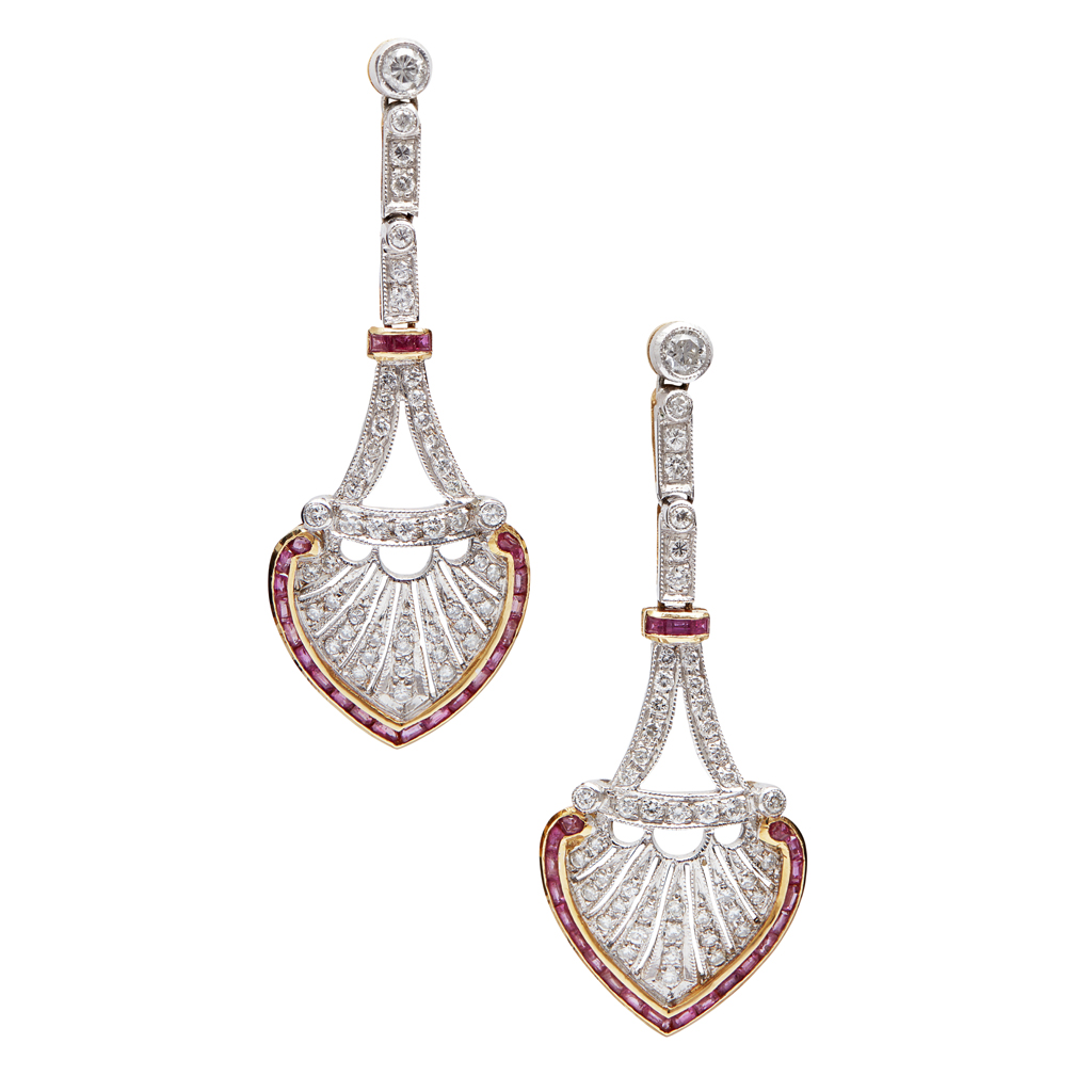 A pair of ruby and diamond set pendant earrings