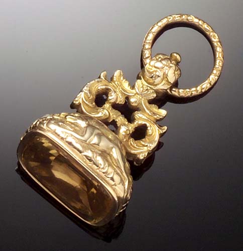 A Victorian gold mounted citrine fob,