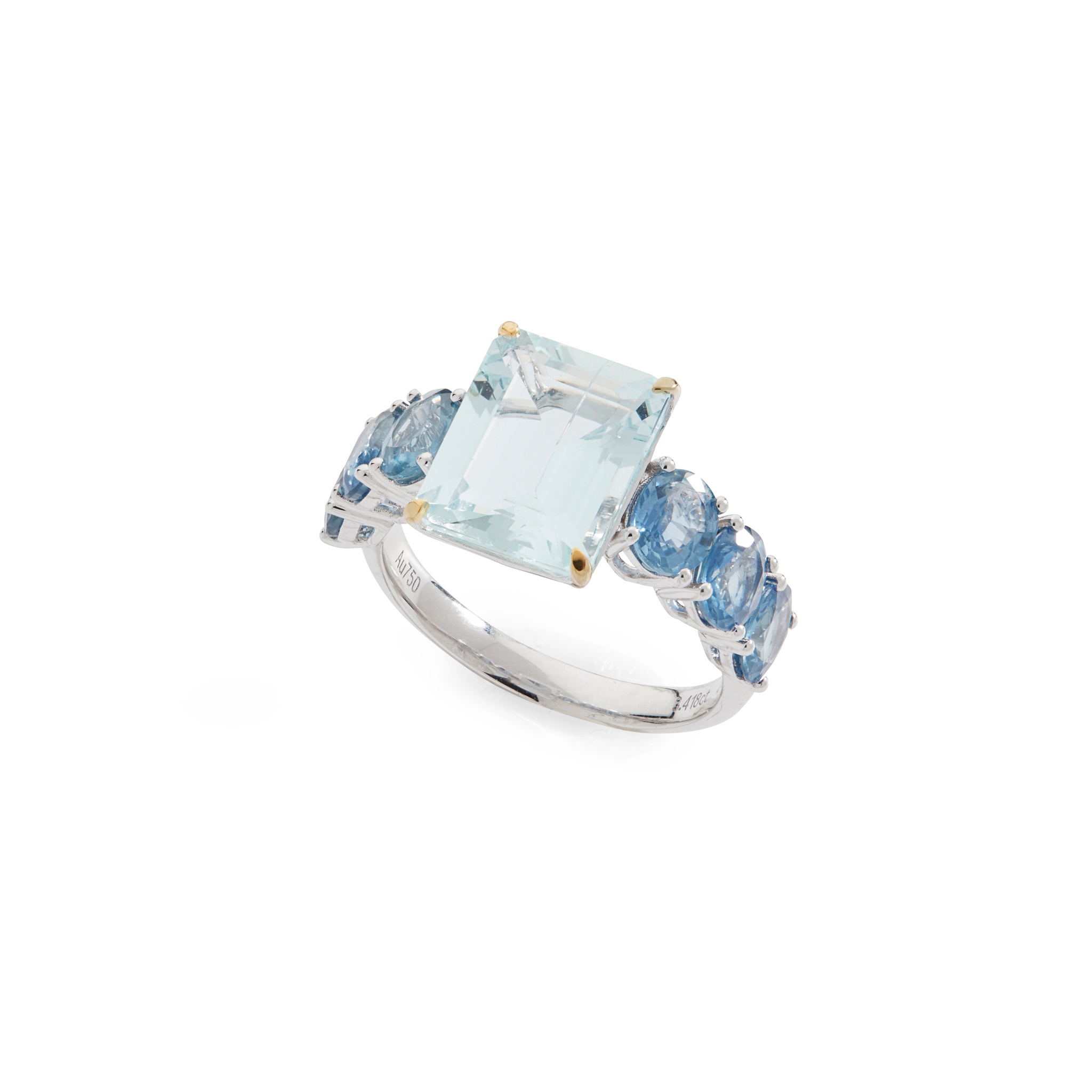 An aquamarine and sapphire ring