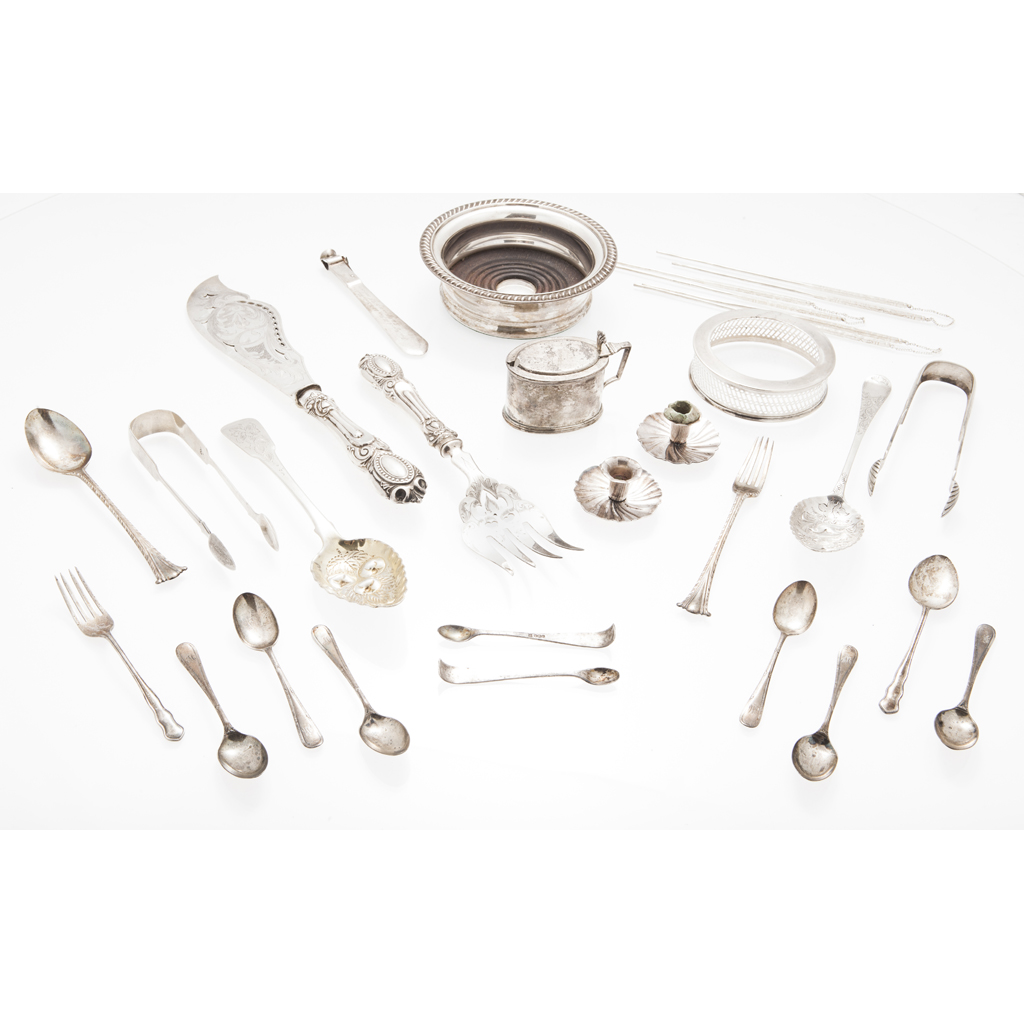 A collection of mixed flatware and other items