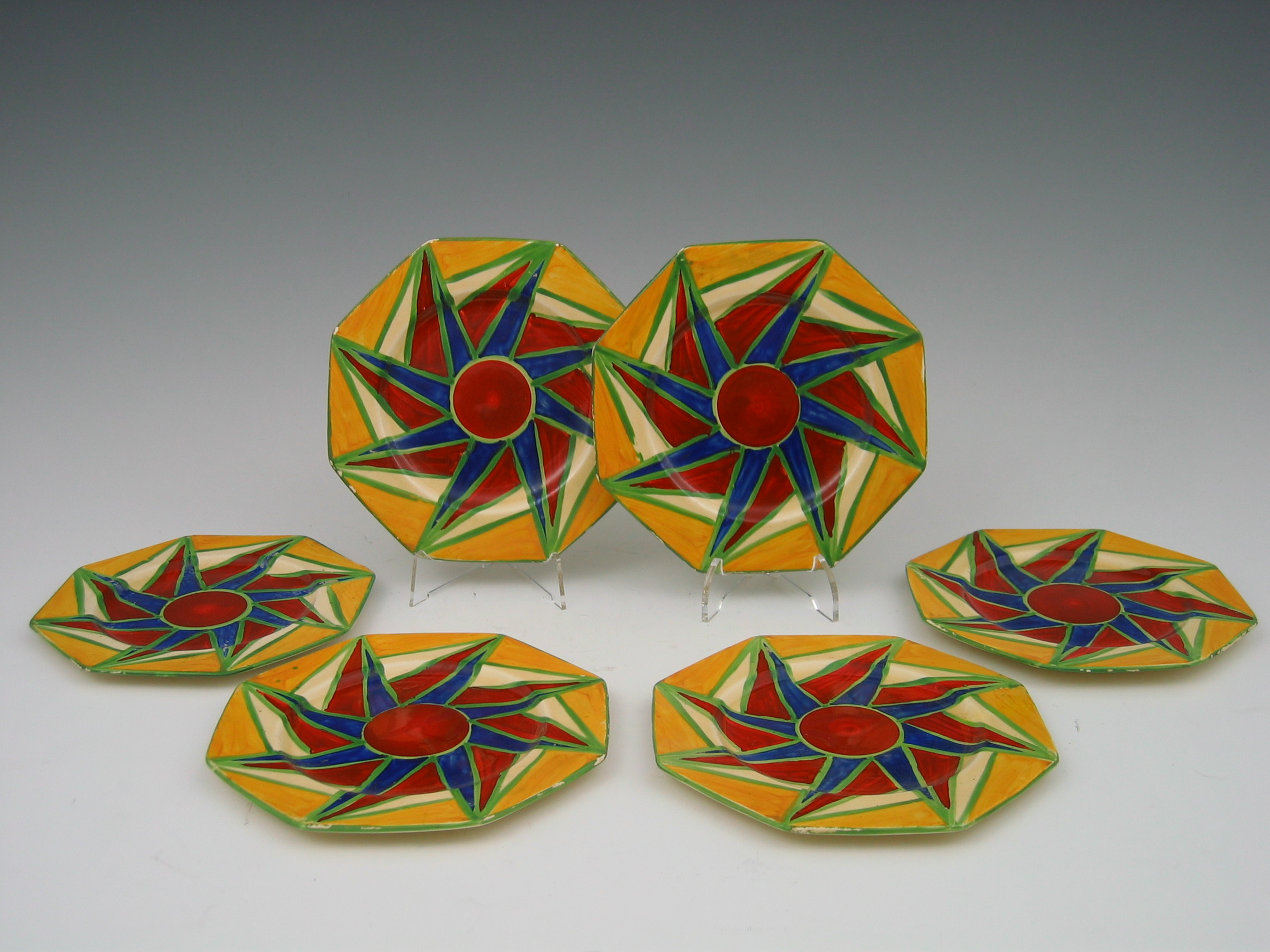 A set of six Clarice Cliff 'Bizarre' side plates,