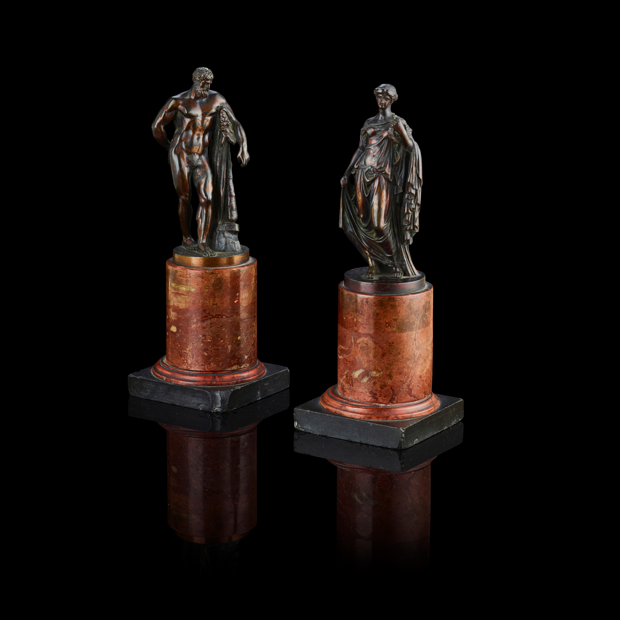 A PAIR OF ITALIAN BRONZE FIGURES OF THE FARNESE HERCULES AND THE FARNESE FLORA, AFTER THE ANTIQUE